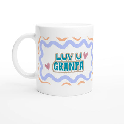 White ceramic mug with colorful design saying love you granpa. Front vue.