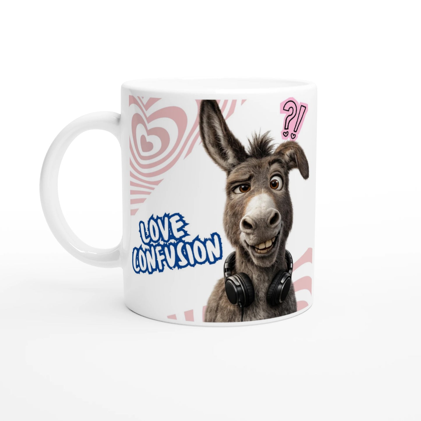 White ceramic mug, with text saying: LOVE CONFUSION, next to a donkey fun with funny mimics, with headphones. Front vue