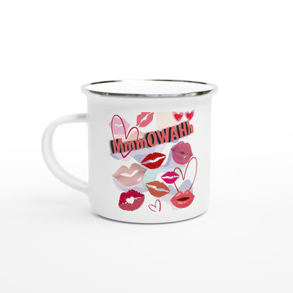 White enamel mug with silver rim with colorful design containg multiple red lips giving kisses.
